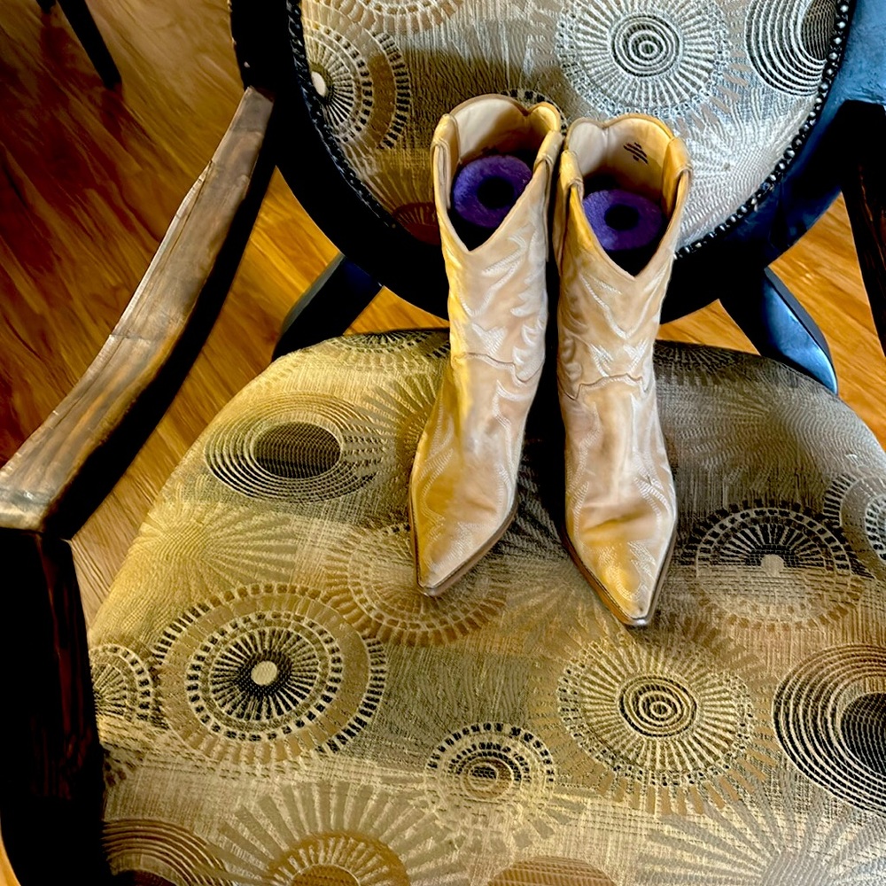 I have some beige cowboy boots with designs on them leather upper